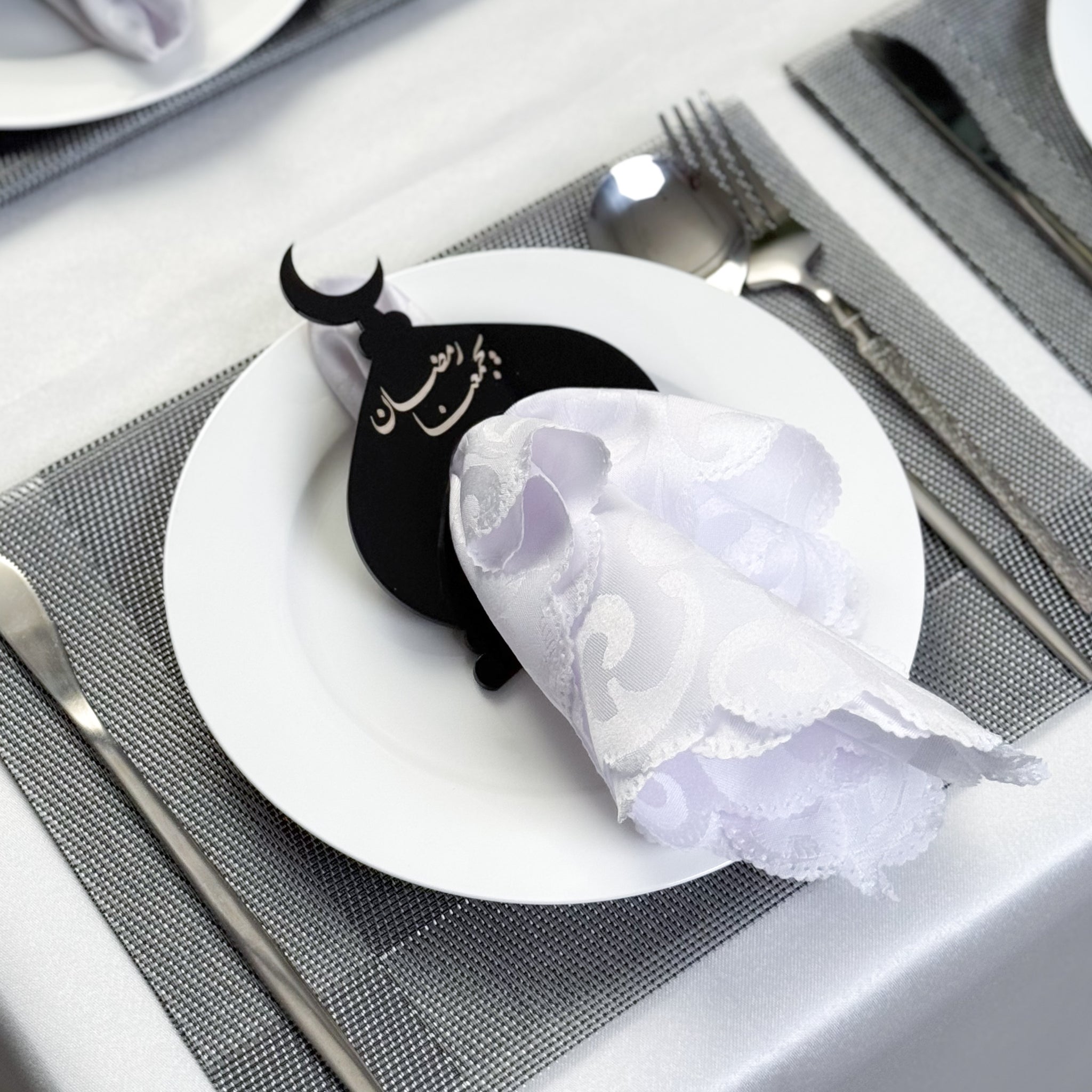 Black napkin and tablecloth holder